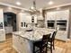 Gourmet kitchen with granite countertops, stainless steel appliances, and a central island at 7106 Royal Oakland Dr, Indianapolis, IN 46236
