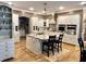 Elegant kitchen with granite counters, stainless appliances, and custom white cabinetry at 7106 Royal Oakland Dr, Indianapolis, IN 46236