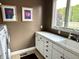 Functional laundry room with washer, dryer, sink and ample counter space at 7106 Royal Oakland Dr, Indianapolis, IN 46236