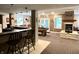 Spacious recreation room featuring a fireplace, pool table, bar, and seating area at 7106 Royal Oakland Dr, Indianapolis, IN 46236