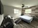 Bedroom with two windows and a pet ramp next to the bed at 729 Maple Ln, Brownsburg, IN 46112