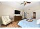A beautiful primary bedroom opens up to the walk-in closet and en suite bathroom at 7413 Misty Woods Ln, Indianapolis, IN 46237