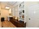 Mudroom with storage, bench seating, and laundry appliances at 7413 Misty Woods Ln, Indianapolis, IN 46237