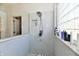 This walk-in shower features beautiful tile, glass enclosure and modern shower head at 7413 Misty Woods Ln, Indianapolis, IN 46237