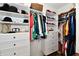 This walk-in closet features custom shelving, storage and plenty of space at 7413 Misty Woods Ln, Indianapolis, IN 46237