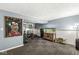 Finished basement with entertainment and exercise areas features a fish aquarium and comfortable ambiance at 7616 E Concord Ln, Fishers, IN 46038
