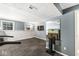 Finished basement with an entertainment area, exercise equipment and a fish aquarium for relaxation at 7616 E Concord Ln, Fishers, IN 46038