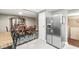 The dining room features a classic dining set and an adjacent kitchen at 7616 E Concord Ln, Fishers, IN 46038