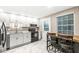 This kitchen features modern appliances, bright cabinets, and an island at 7616 E Concord Ln, Fishers, IN 46038