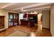 Open kitchen features beams, modern appliances, breakfast bar and hardwood floors at 7721 Hollybrook Ln, Indianapolis, IN 46227