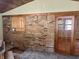 The sunroom features brick walls, wood trim, brick floor, and sliding glass doors at 7721 Hollybrook Ln, Indianapolis, IN 46227