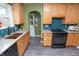 Updated kitchen showcasing stainless steel sink, appliances, and granite countertops at 828 N Butler Ave, Indianapolis, IN 46219
