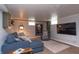 Cozy living room featuring a sofa, accent chair, and decorative touches at 828 N Butler Ave, Indianapolis, IN 46219