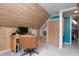 Home office featuring neutral walls, carpet floors, and a sleek wooden desk with drawers at 828 N Butler Ave, Indianapolis, IN 46219