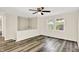 Bedroom with new luxury vinyl plank flooring and ceiling fan at 8920 Caminito Rd, Indianapolis, IN 46234