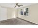 Comfortable bedroom with ceiling fan and bright windows, creating a peaceful retreat at 8920 Caminito Rd, Indianapolis, IN 46234