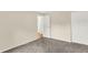 A cozy bedroom with carpet, a window, and neutral walls, creating a relaxing space at 8920 Caminito Rd, Indianapolis, IN 46234