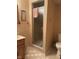 Bathroom featuring a shower stall, neutral-toned walls, vanity, and a toilet at 9011 Camby Rd, Camby, IN 46113