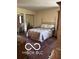 Bedroom featuring an area rug, natural light, large closet, and comfortable decor at 9011 Camby Rd, Camby, IN 46113