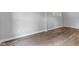 Bedroom featuring laminate flooring, base molding and many electrical outlets for convenience at 917 W Pearl St, Lebanon, IN 46052