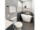 Bright bathroom with a freestanding tub, modern fixtures, and stylish tiling detail, creating a relaxing atmosphere at 9302 N Bayland Dr, McCordsville, IN 46055