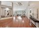 Spacious living room featuring vaulted ceilings, hardwood floors, and ample natural light at 9302 N Bayland Dr, McCordsville, IN 46055