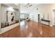 Spacious living room featuring vaulted ceilings, hardwood floors, and ample natural light at 9302 N Bayland Dr, McCordsville, IN 46055