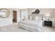 Cozy bedroom featuring stylish decor, a patterned bedspread, and ample natural light at 9334 Hemingway Dr, Indianapolis, IN 46239