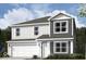 Charming two-story home with a modern design and a two-car garage and white and gray siding at 9334 Hemingway Dr, Indianapolis, IN 46239