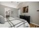 Cozy bedroom featuring a queen bed and a black dresser; a great place to unwind and recharge at 9520 Settlement W Dr, Indianapolis, IN 46250