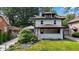 Charming two-story home with landscaped front yard and inviting front porch at 953 E 34Th St, Indianapolis, IN 46205
