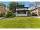 Charming two-story home with a well-manicured lawn at 953 E 34Th St, Indianapolis, IN 46205