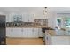 Beautiful kitchen with white cabinets, granite countertops, and stainless steel appliances at 953 E 34Th St, Indianapolis, IN 46205