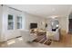 Bright living room with hardwood floors, recessed lighting, and neutral paint at 953 E 34Th St, Indianapolis, IN 46205