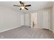 The main bedroom includes carpet floors, two closets, and easy access to the bathroom at 953 E 34Th St, Indianapolis, IN 46205