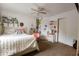 Inviting bedroom with a cozy bed, ceiling fan, and personalized decor at 982 Ramsgate Rd, Greenwood, IN 46143