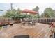 Outdoor deck with comfortable seating and an umbrella, ideal for relaxing or entertaining at 982 Ramsgate Rd, Greenwood, IN 46143
