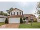 Charming two-story home with a two-car garage and well-maintained front yard at 982 Ramsgate Rd, Greenwood, IN 46143