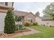 Charming single-Gathering home with a well-manicured lawn and mature landscaping at 982 Ramsgate Rd, Greenwood, IN 46143