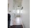 Bright hallway with tile flooring leads to the front door, offering a welcoming entrance to the home at 982 Ramsgate Rd, Greenwood, IN 46143
