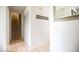 Clean hallway with tile flooring, closet and stairway to the upper level at 982 Ramsgate Rd, Greenwood, IN 46143