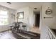 Kitchen dining area with modern table set, pendant lighting, and views of stairway at 982 Ramsgate Rd, Greenwood, IN 46143