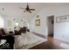 Bright living room featuring vaulted ceilings, dark wood floors, and comfortable seating arrangements at 982 Ramsgate Rd, Greenwood, IN 46143