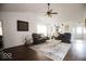 Comfortable living room featuring dark wood floors and a cozy seating area at 982 Ramsgate Rd, Greenwood, IN 46143