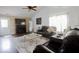 Comfortable living room with vaulted ceilings, a fireplace and large windows with lots of natural light at 982 Ramsgate Rd, Greenwood, IN 46143