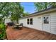 Spacious back deck for entertaining or relaxing outdoors with a table and chairs at 99 Old Trail Dr, Bargersville, IN 46106