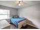 This cozy bedroom features hardwood floors, fresh paint, and a ceiling fan at 99 Old Trail Dr, Bargersville, IN 46106