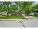 Traditional brick ranch home on a tree-lined street with a charming front porch at 99 Old Trail Dr, Bargersville, IN 46106