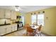 Inviting kitchen area with tile floor, bright natural light, and modern appliances at 99 Old Trail Dr, Bargersville, IN 46106