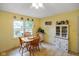 Sunny kitchen with tile floor, modern appliances, and a cozy eat-in area at 99 Old Trail Dr, Bargersville, IN 46106
